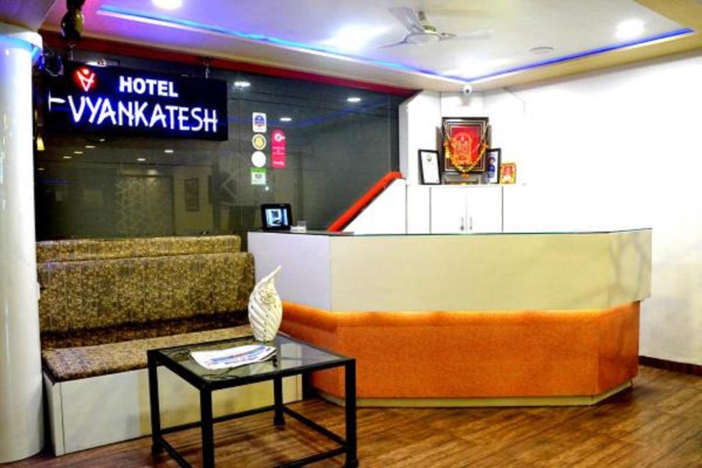 A seating area at Hotel Vyankatesh & Pure Veg Restaurant