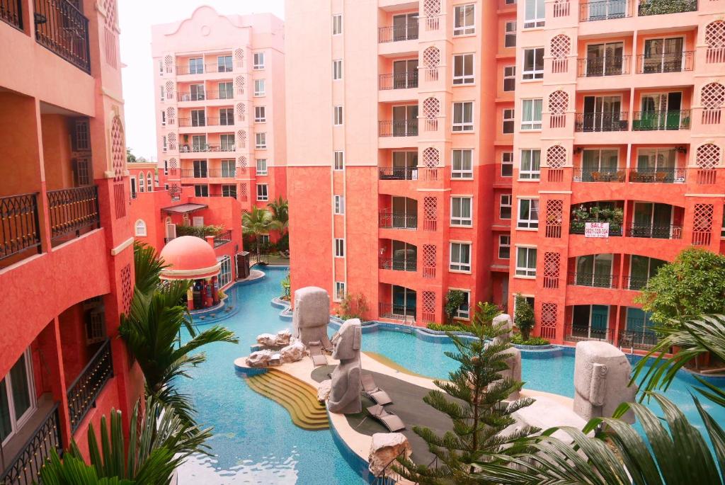a view of a water park in a city with tall buildings at Seven Seas Resort Pattaya & Sofa bed in Jomtien Beach