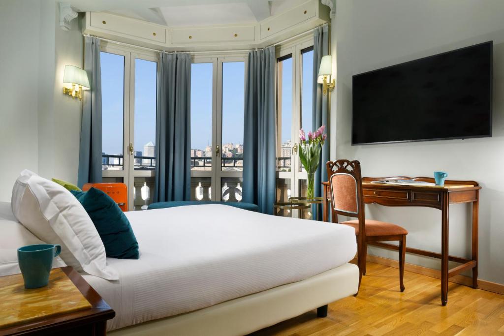 TV a/nebo společenská místnost v ubytování Hotel Continental Genova