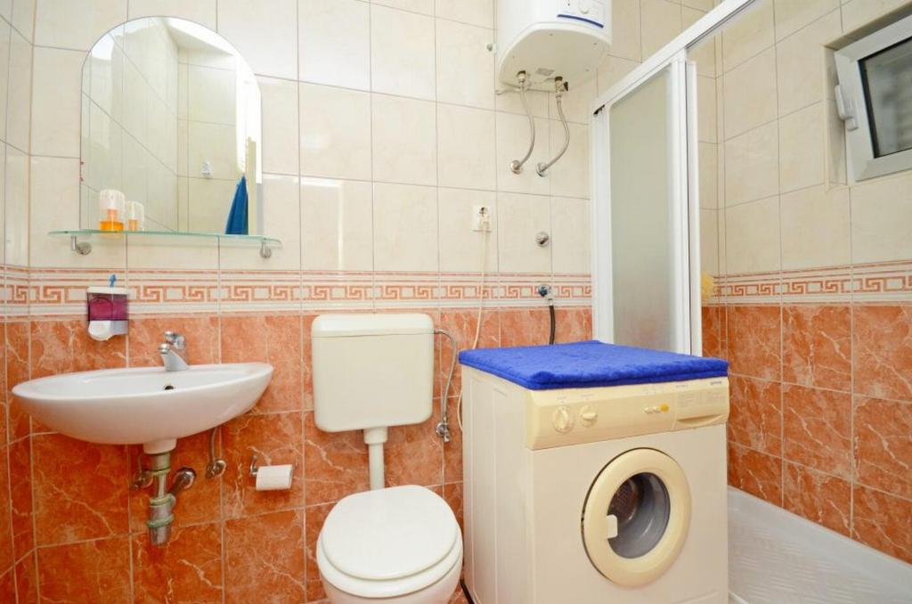 Kúpeľňa v ubytovaní Apartments Doris