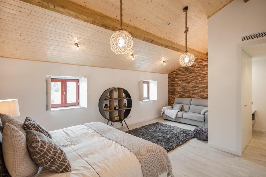 Postel nebo postele na pokoji v ubytování Porto Deluxe Suites