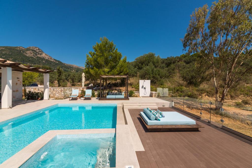 The swimming pool at or close to Porto Vasilikos Villas