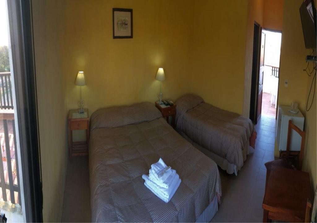 Postel nebo postele na pokoji v ubytování Posada del Navegante