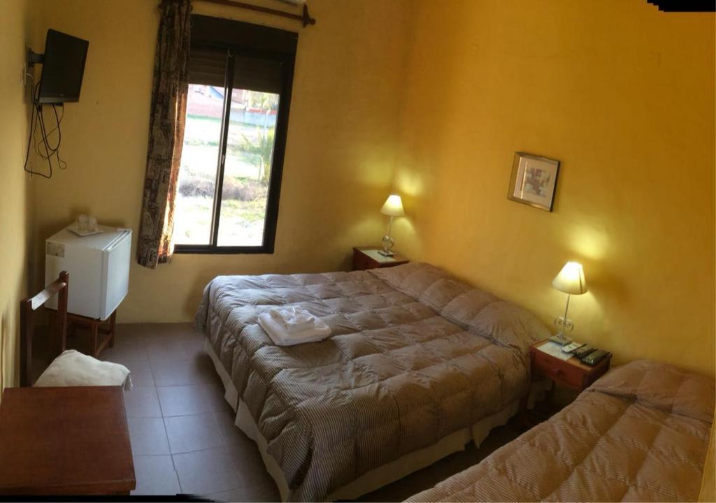 Postel nebo postele na pokoji v ubytování Posada del Navegante