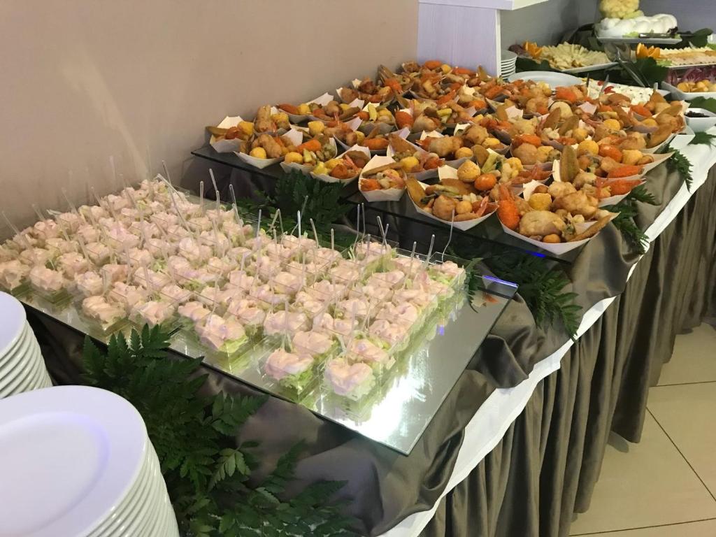 a buffet line with many different types of food at Bikini Hotel in Vieste
