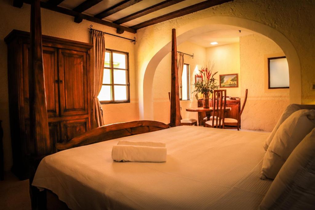 Uma cama ou camas num quarto em Casa Tia Micha