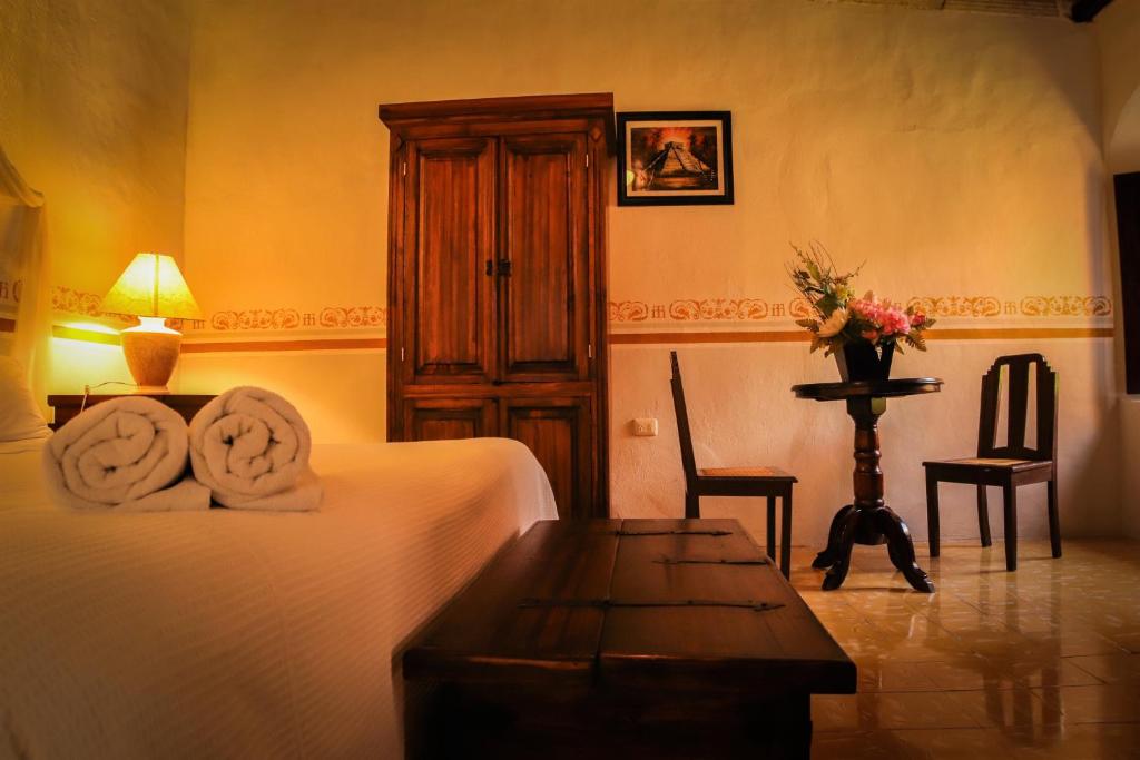 Uma cama ou camas num quarto em Casa Tia Micha