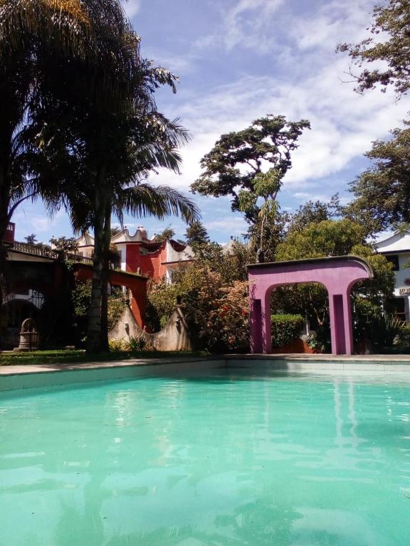 Bazén v ubytování Hotel Hacienda Xico Inn nebo v jeho okolí