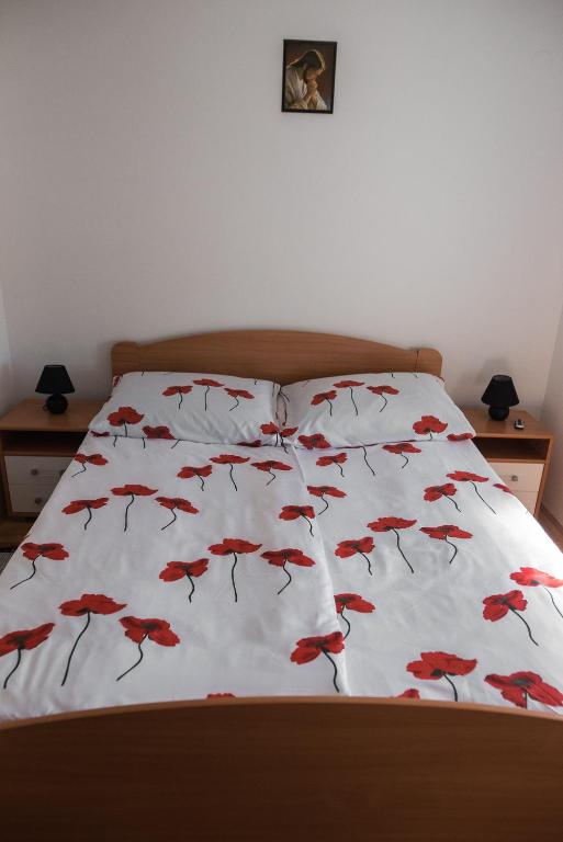 Postel nebo postele na pokoji v ubytování Apartman "JOKA"
