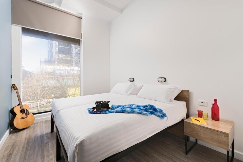 Postel nebo postele na pokoji v ubytování Hostel G Perth