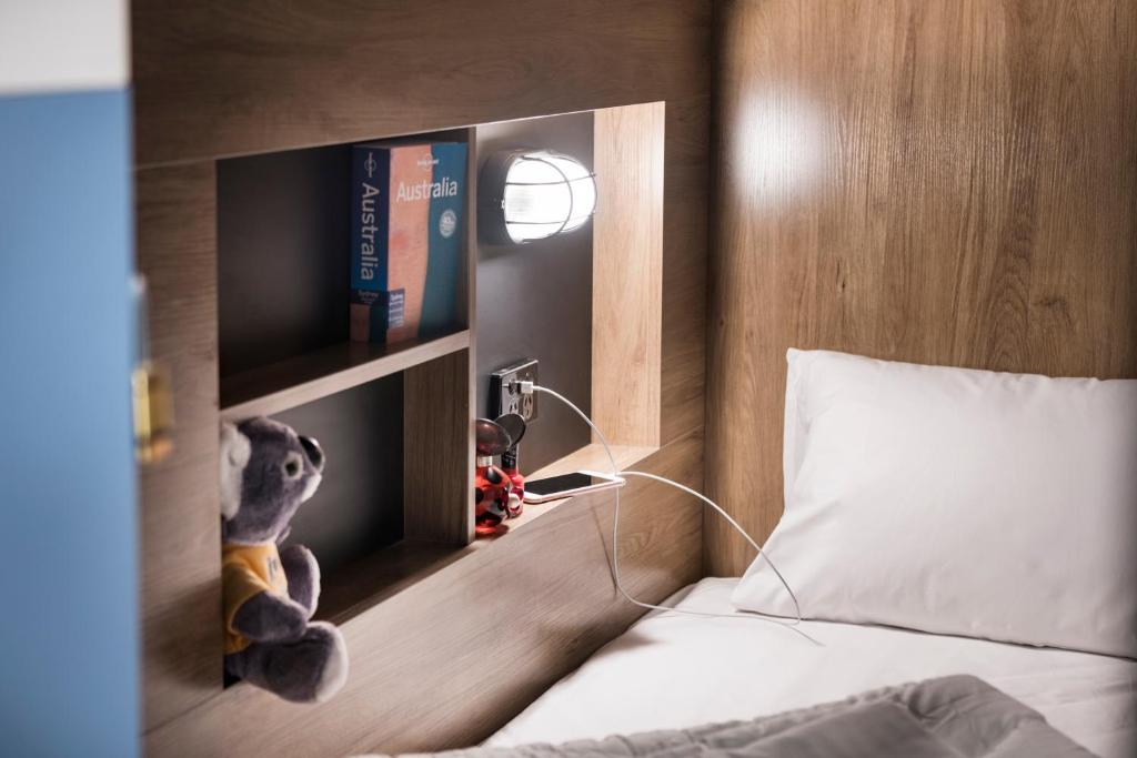 Postel nebo postele na pokoji v ubytování Hostel G Perth