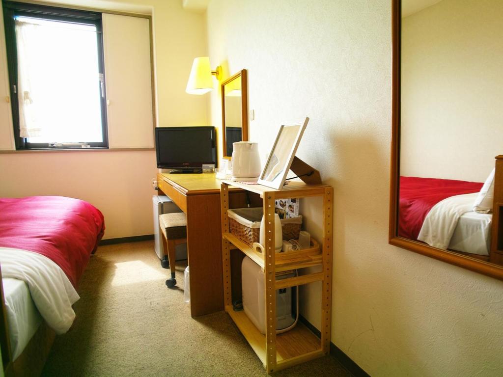 TV a/nebo společenská místnost v ubytování Tourist Hotel Hitachi