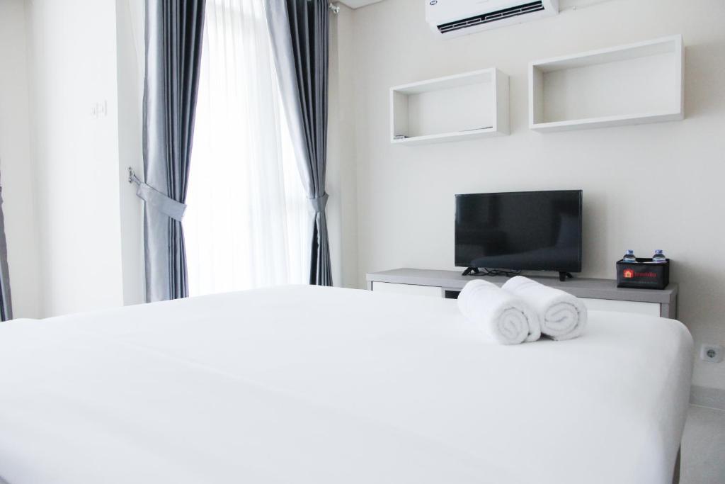 Cozy Studio Apartment at Elpis Residence By Travelio - Studio-Apartment