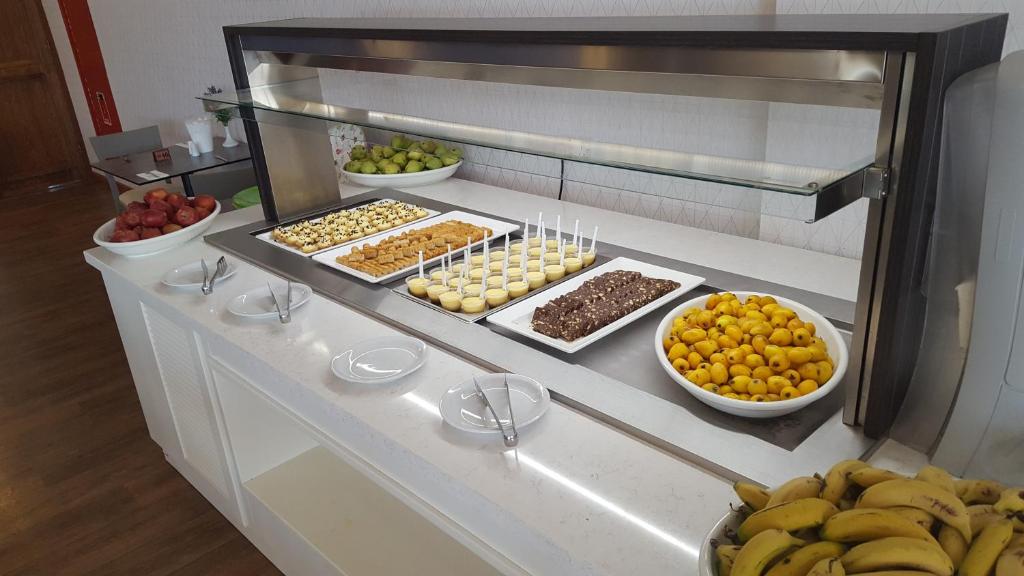 a buffet with many different types of fruits and vegetables at Aktea Beach Village in Ayia Napa