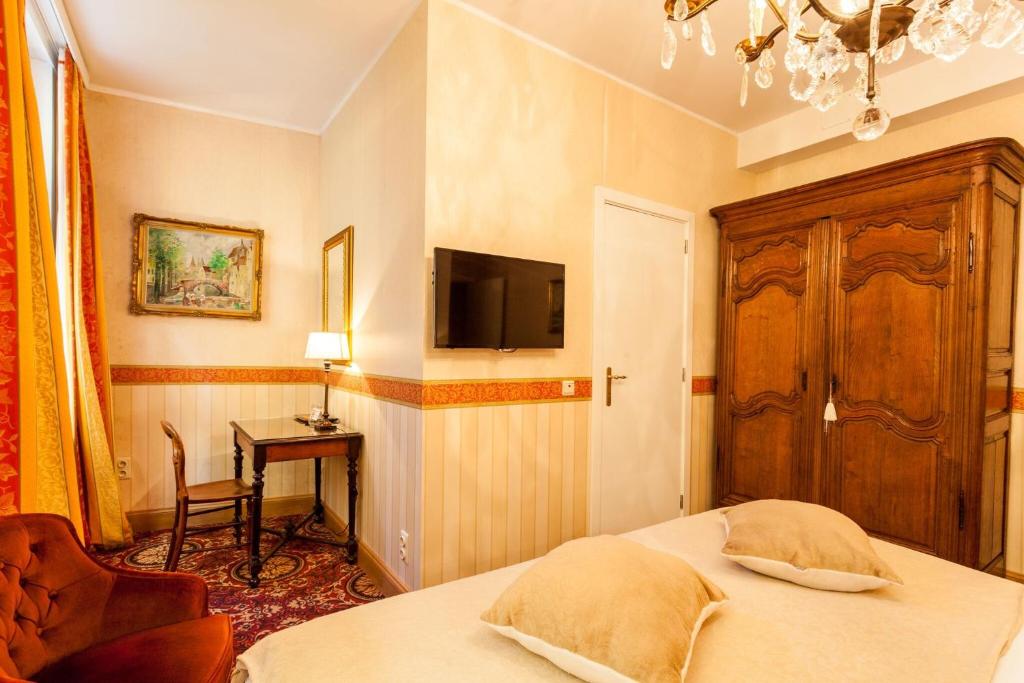 Postel nebo postele na pokoji v ubytování Avenue Hotel by F-Hotels