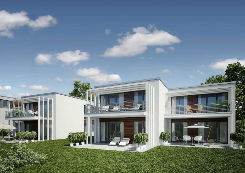 a rendering of a house with a lawn at Ferienwohnung Sundüberblick in Altefähr