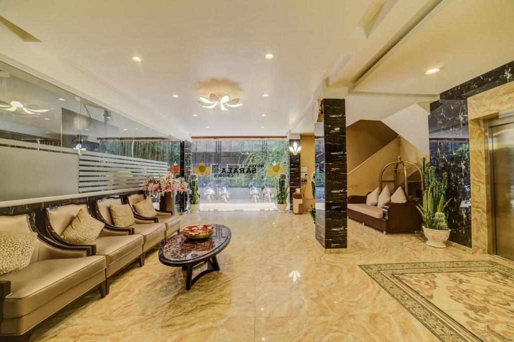 Un lugar para sentarse en FabHotel Prime Sarala Crown With Pool - Nr Calangute Beach