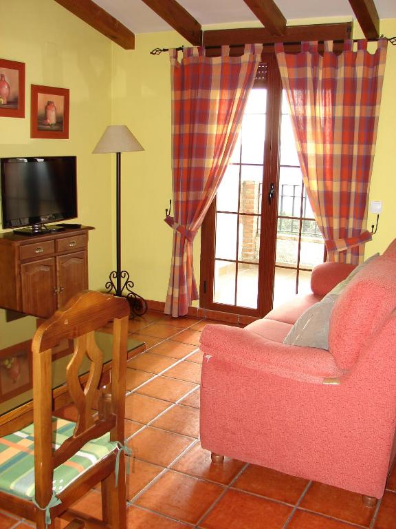 Zona de estar de Apartamentos Sierra de Segura