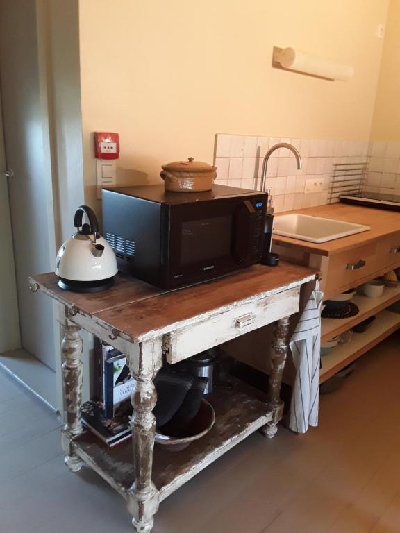 Kuchyň nebo kuchyňský kout v ubytování B&B Sapere