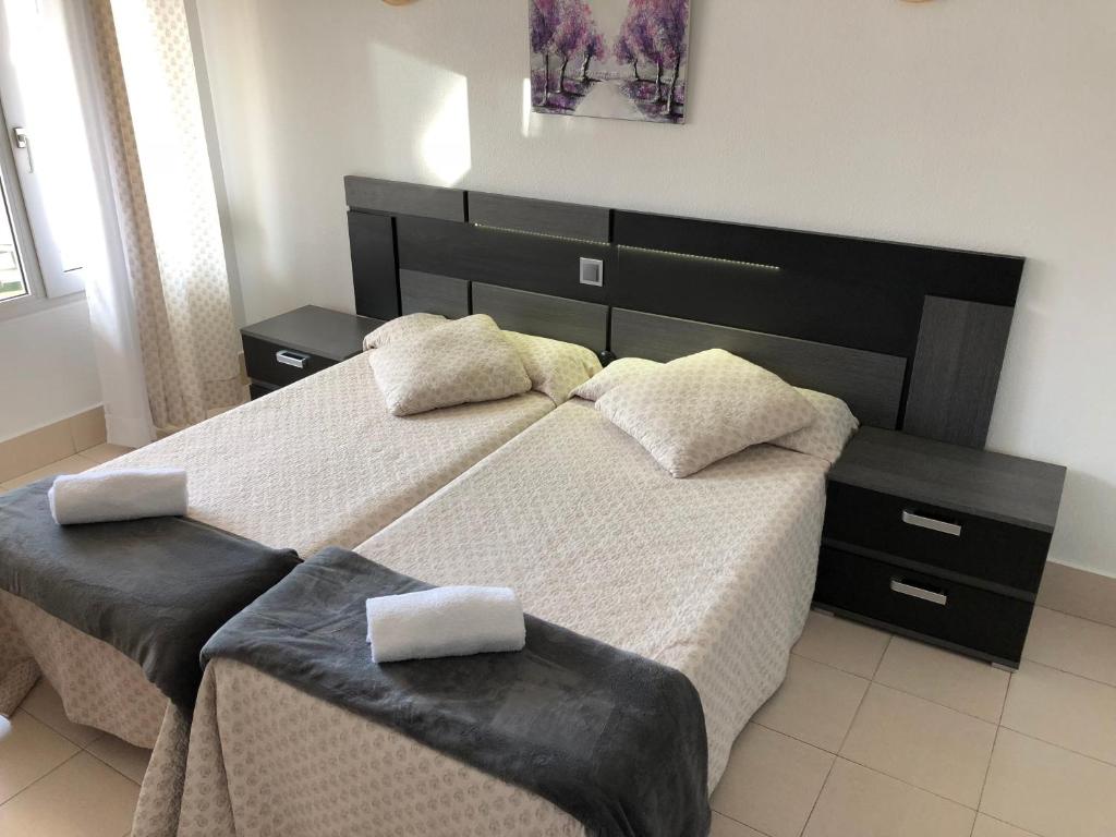 Postel nebo postele na pokoji v ubytování Hotel Costa Mar