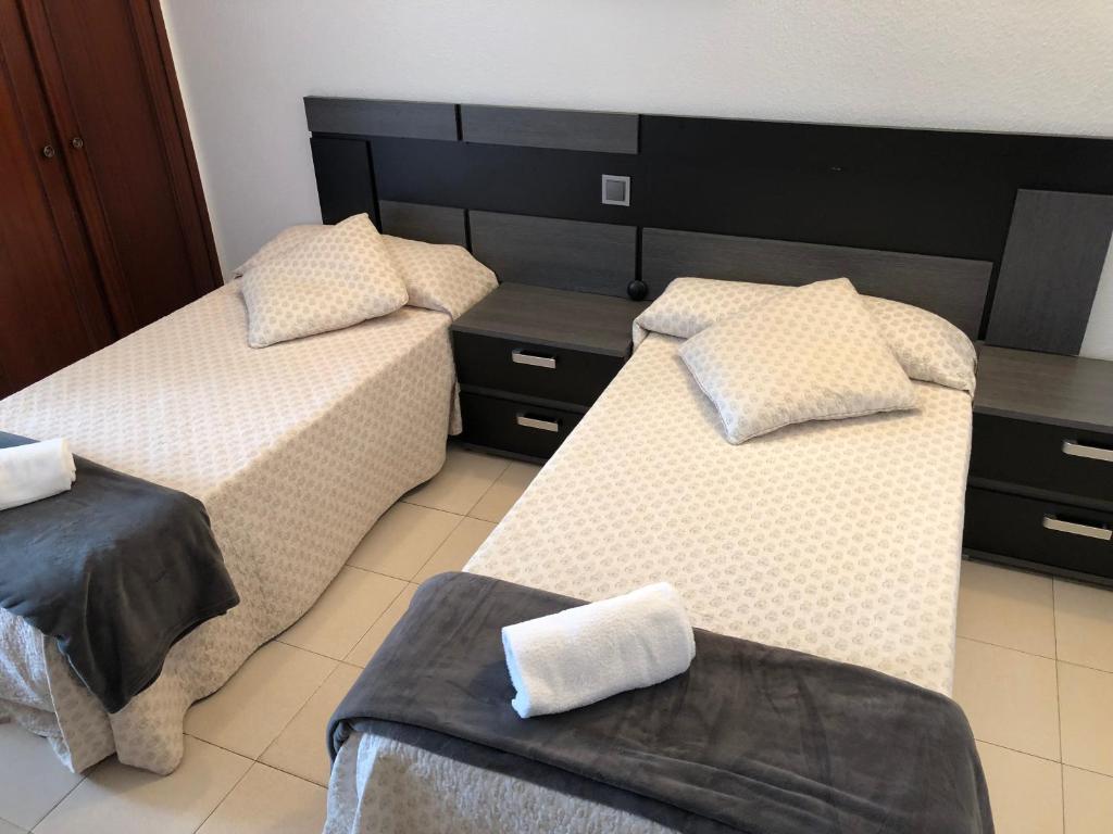 Postel nebo postele na pokoji v ubytování Hotel Costa Mar