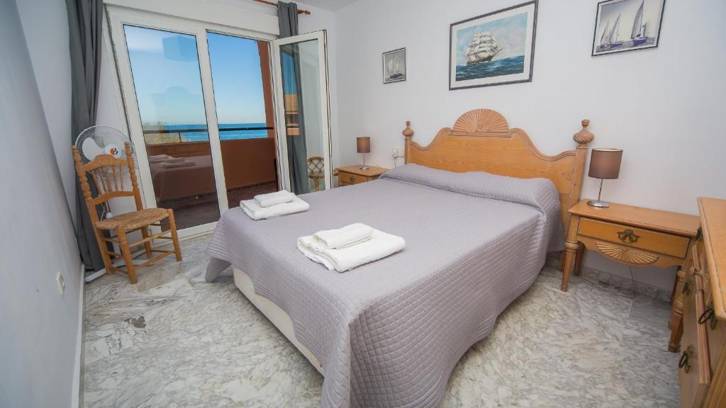 Postel nebo postele na pokoji v ubytování Manilva Beach 109