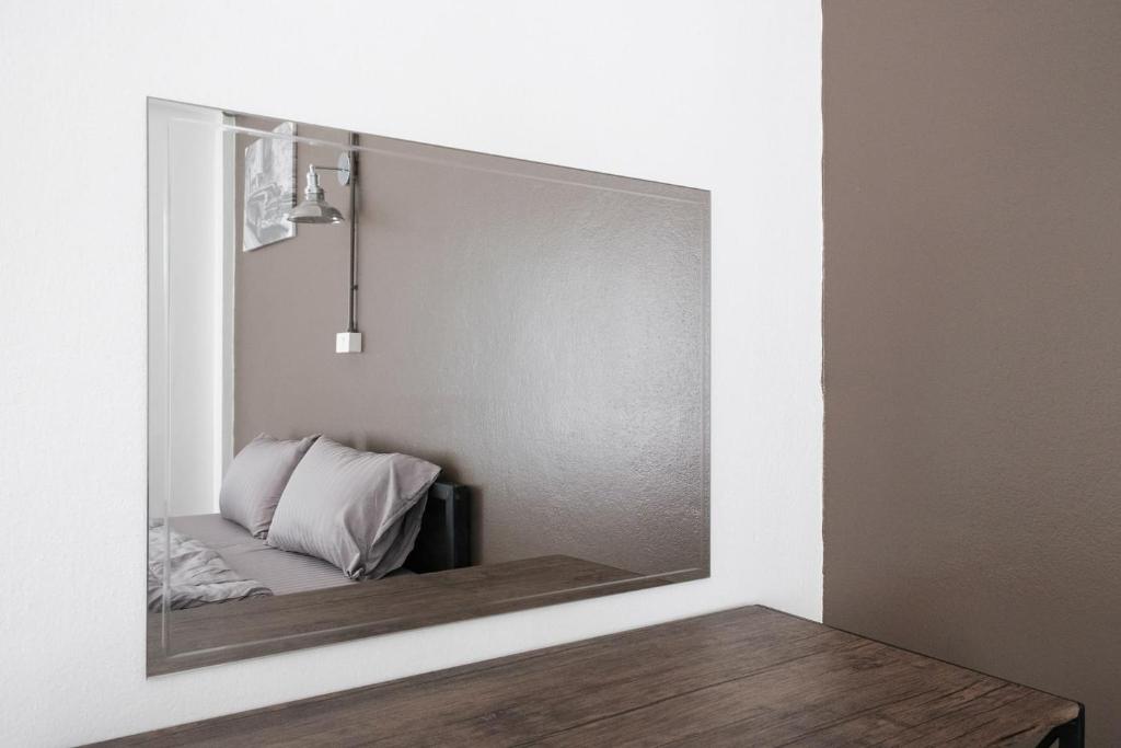 Postel nebo postele na pokoji v ubytování Pangtip