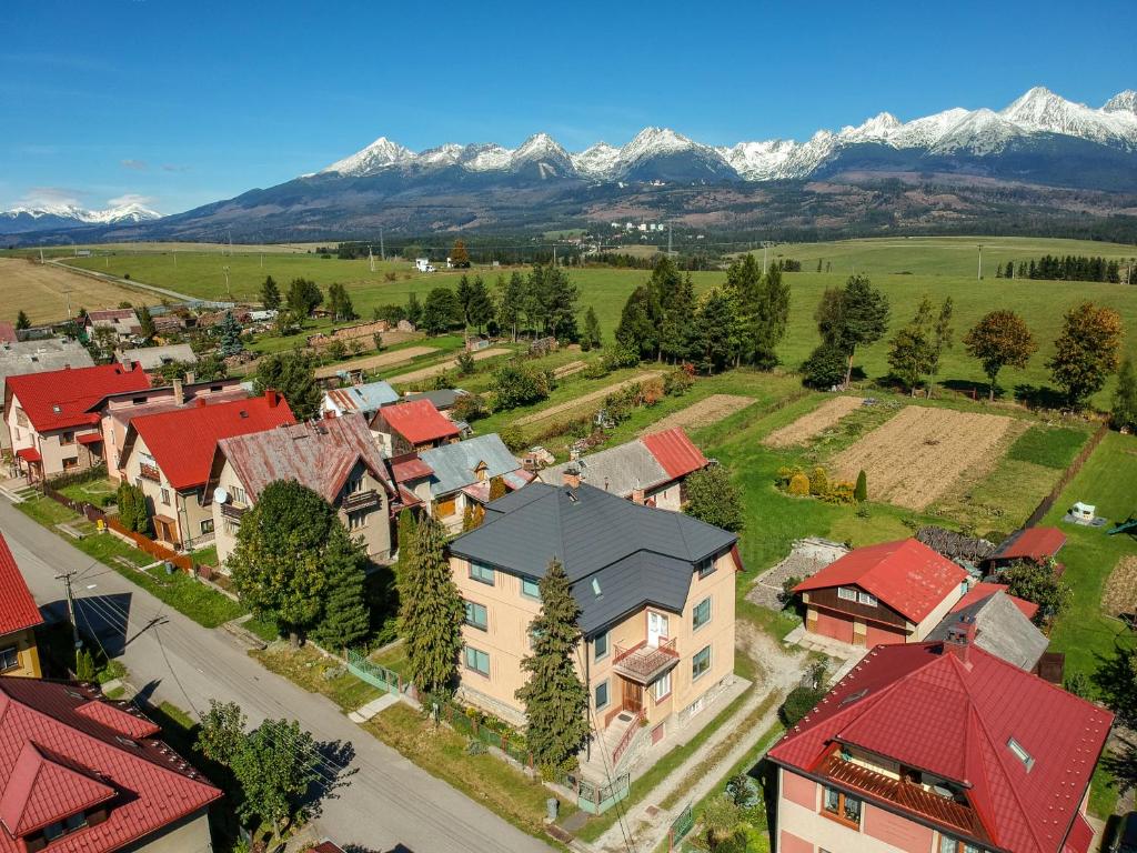 an aerial view of a village with mountains in the background at Guest House Privát Štrba in Štrba