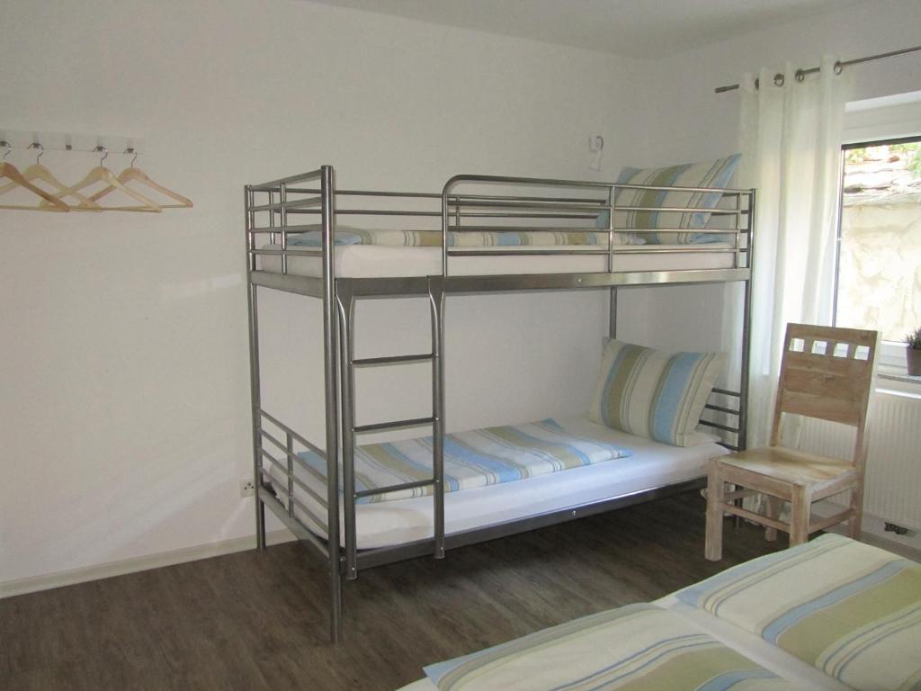 Postel nebo postele na pokoji v ubytování Dilger Apartments