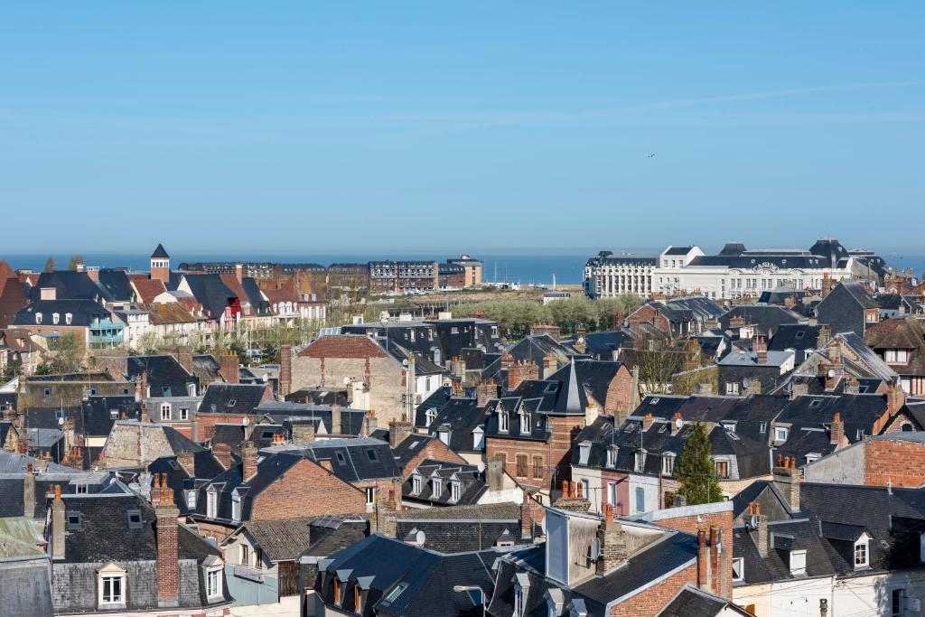 an aerial view of a city with houses at Villa Médicis Trouville-sur-mer in Trouville-sur-Mer