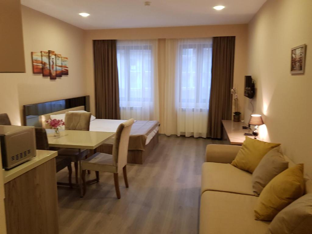 Posezení v ubytování Sweet Apartment New Gudauri suites