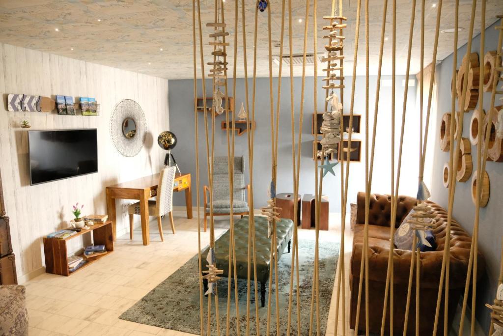 TV a/nebo společenská místnost v ubytování Royal Beach Hostel