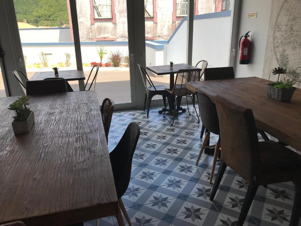 Posezení v ubytování Royal Beach Hostel