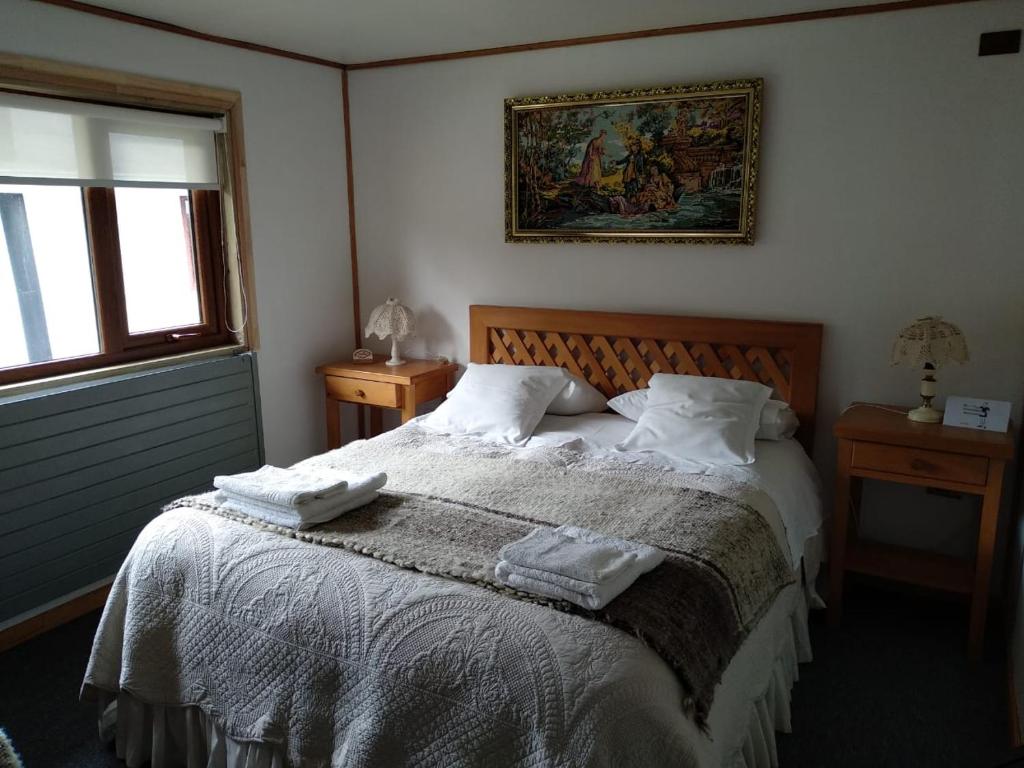 Postel nebo postele na pokoji v ubytování Hotel Mi Casa