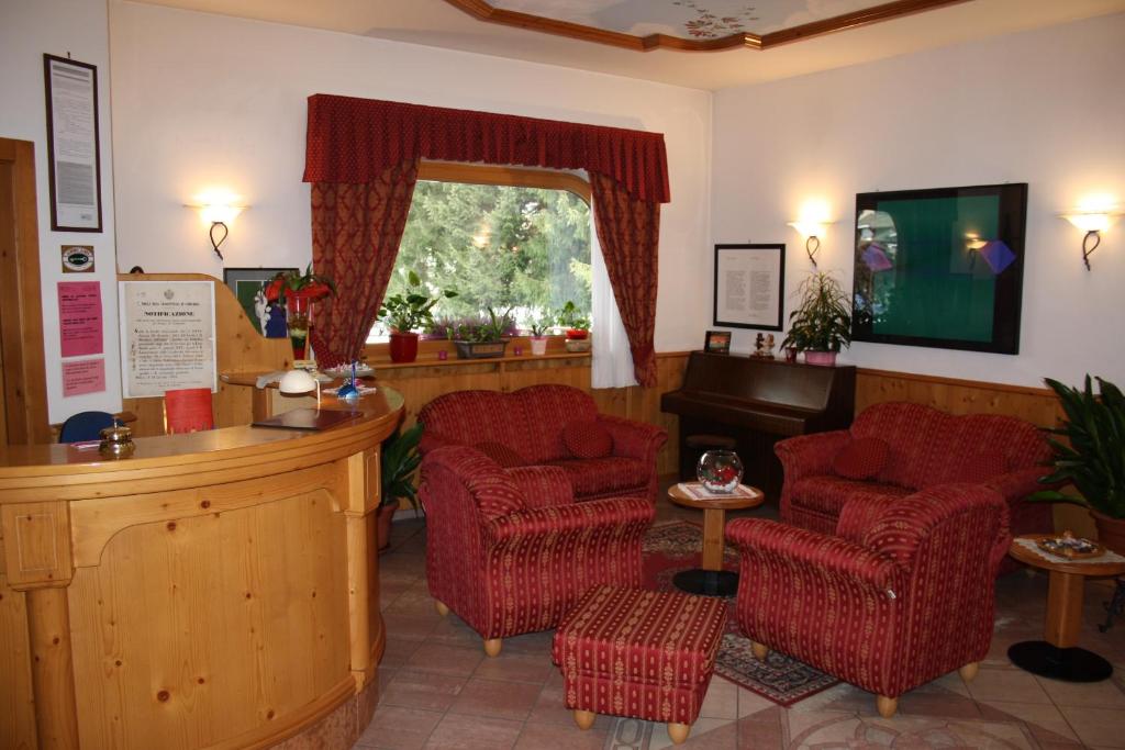 Posezení v ubytování HOTEL La Locanda