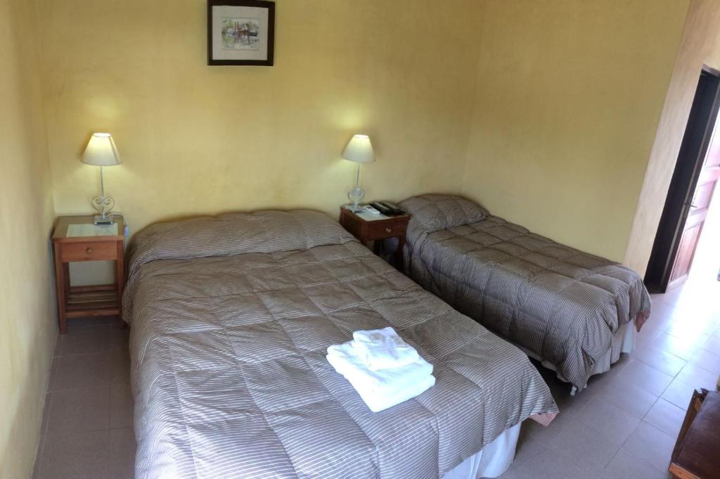 Postel nebo postele na pokoji v ubytování Posada del Navegante