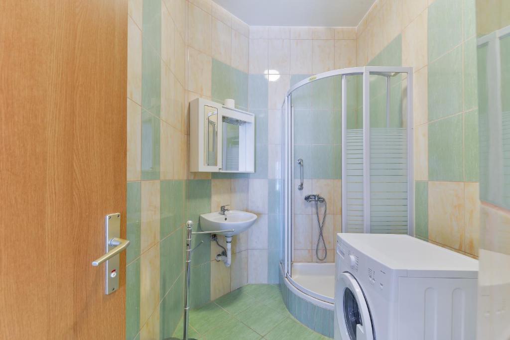 Koupelna v ubytování Apartments Lavanda