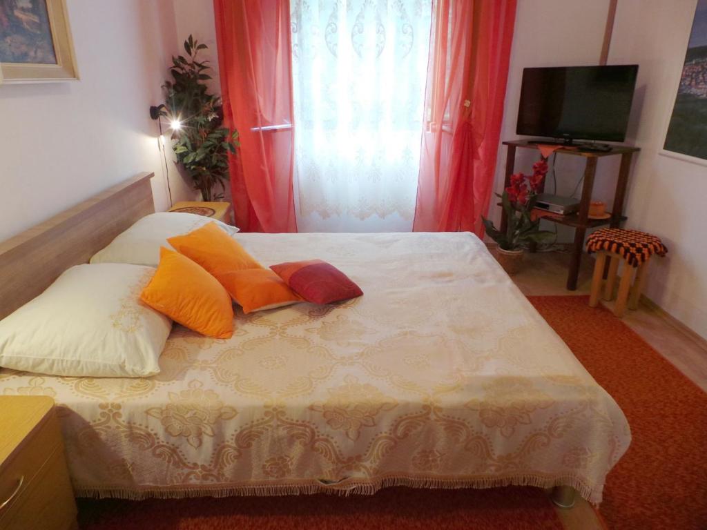 Posteľ alebo postele v izbe v ubytovaní Apartment Jablanac 1