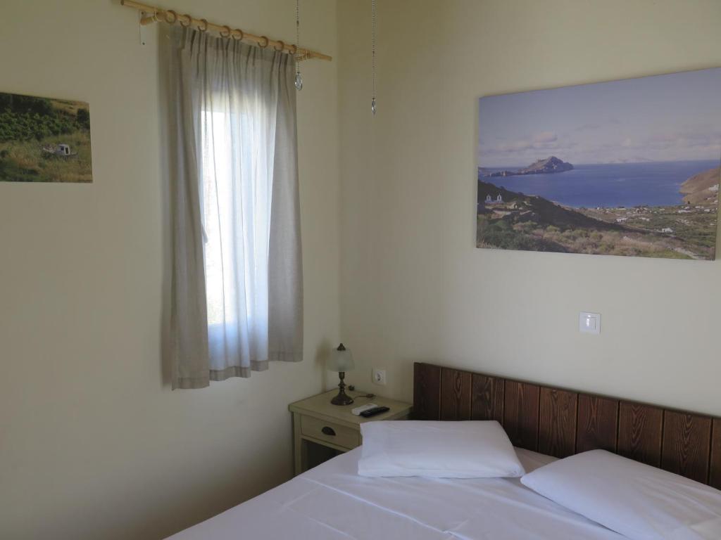 Postel nebo postele na pokoji v ubytování Kaminaki Amorgos