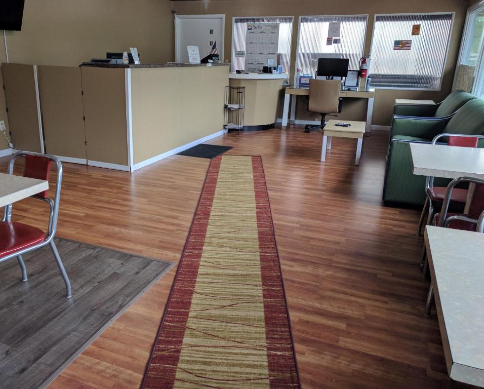 an empty office with a red stripe on the floor at The Simplicity Inn in Marshfield