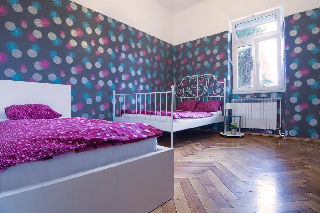 Posteľ alebo postele v izbe v ubytovaní Guesthouse Centar 2
