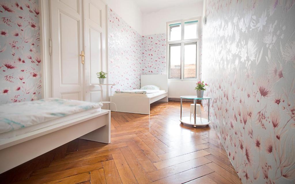 Posteľ alebo postele v izbe v ubytovaní Guesthouse Centar 2