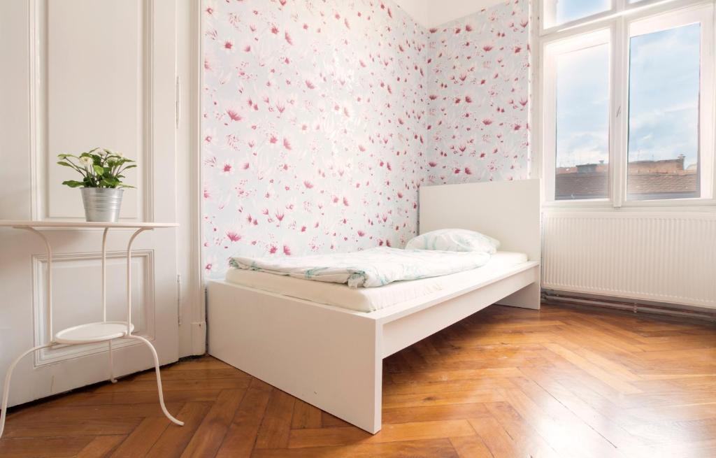 Posteľ alebo postele v izbe v ubytovaní Guesthouse Centar 2