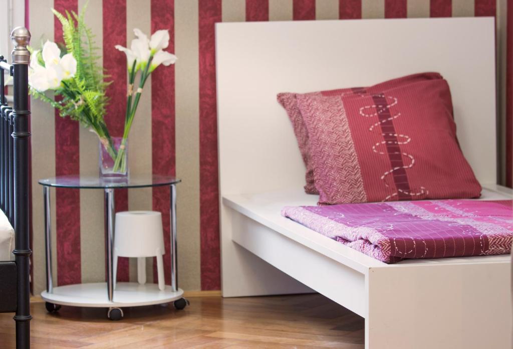 Posteľ alebo postele v izbe v ubytovaní Guesthouse Centar 2