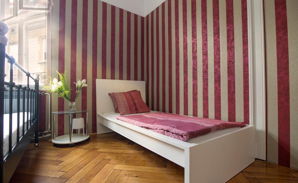 Posteľ alebo postele v izbe v ubytovaní Guesthouse Centar 2