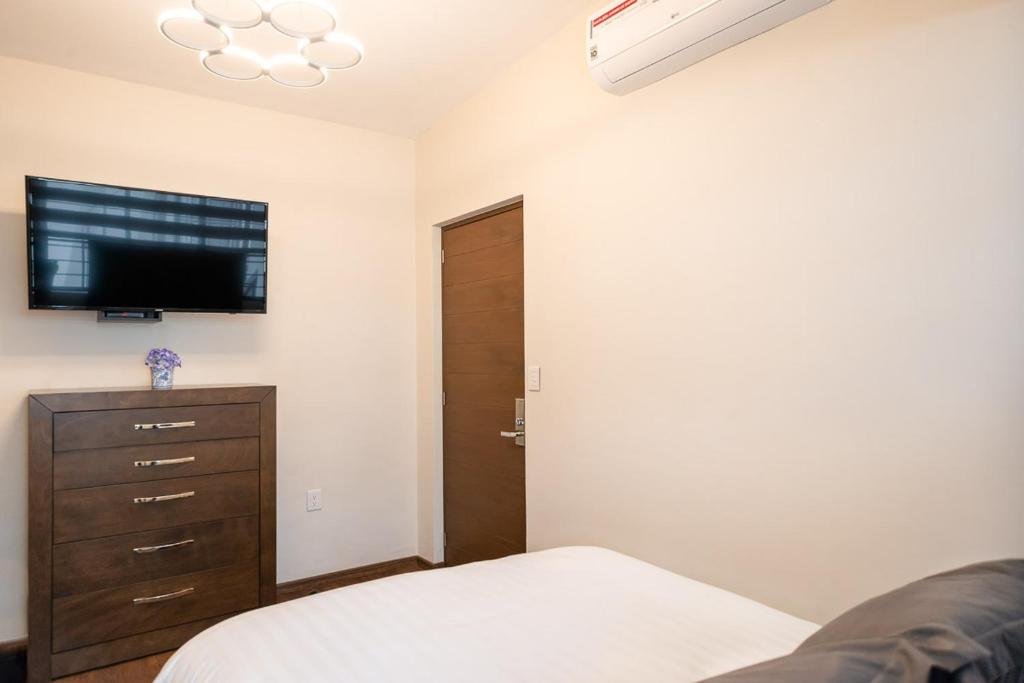 Postel nebo postele na pokoji v ubytování Hotel Posada XR