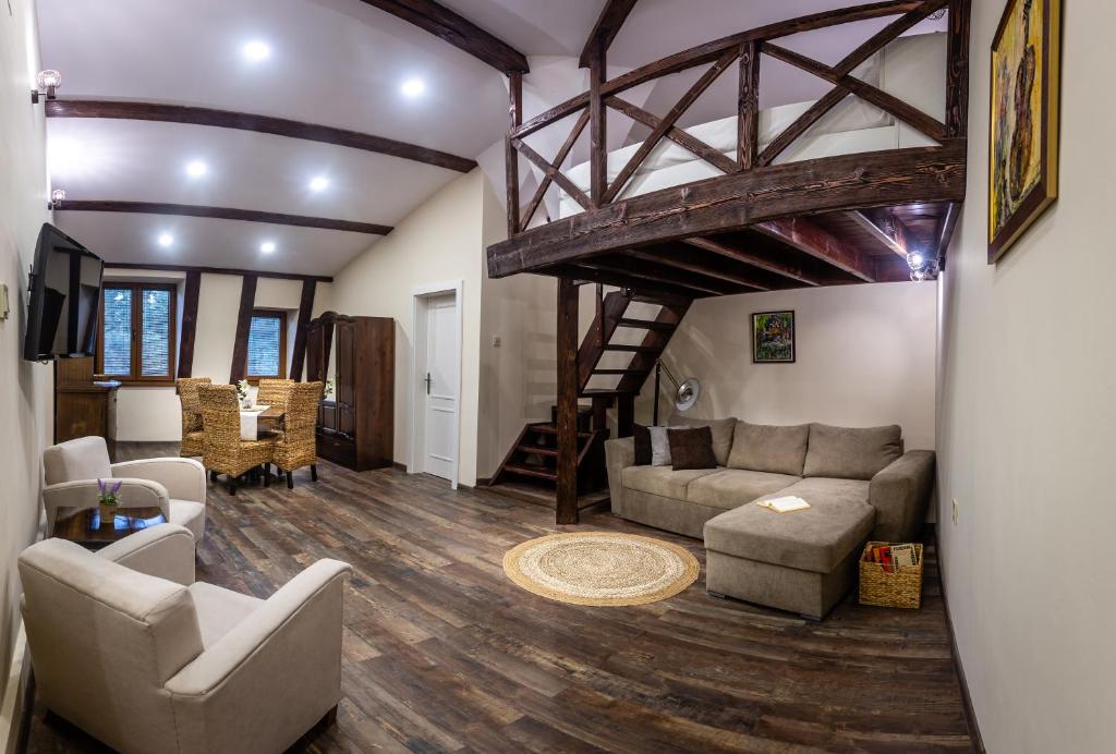 a living room with couches and a loft at Central Loft in Plovdiv