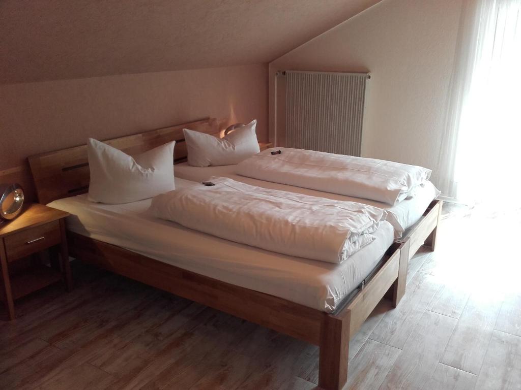Postel nebo postele na pokoji v ubytování Sonneneck