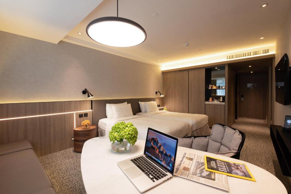 TV a/nebo společenská místnost v ubytování Nathan Hotel