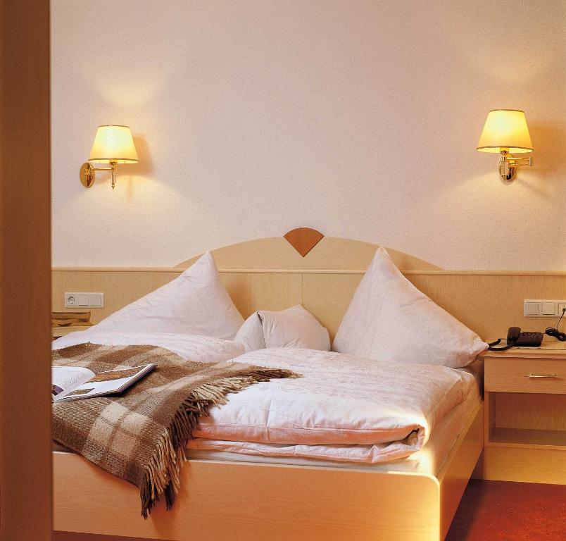 Postel nebo postele na pokoji v ubytování Ferienresidenz La Vita